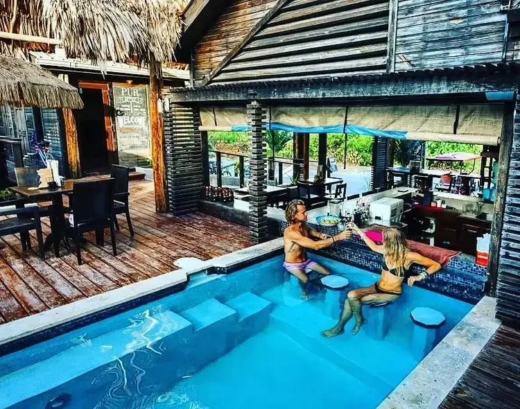pur-boutique-cabanas-pool-bar-experience-ambergris-caye-belize-resort.webp