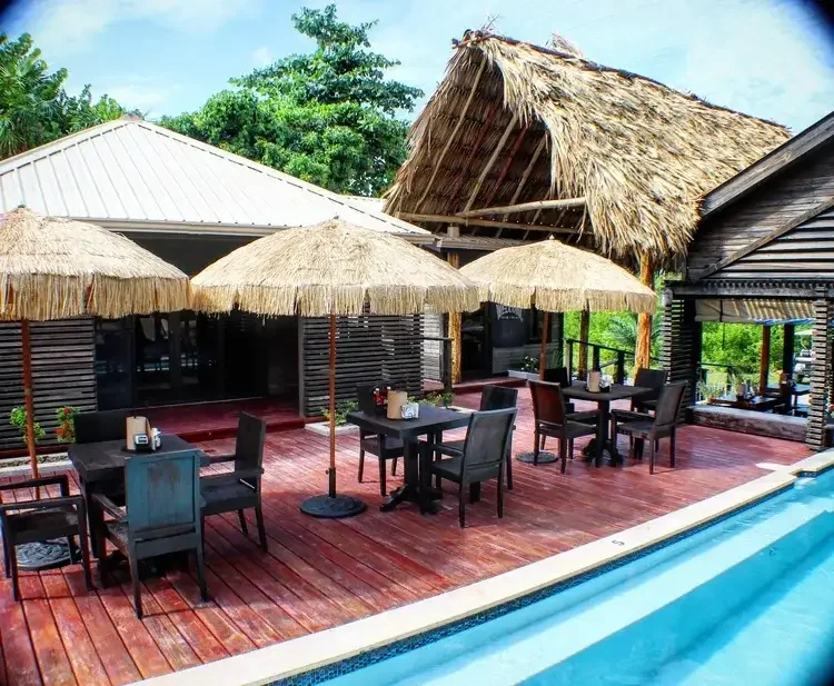pur-boutique-cabanas-poolside-dining-ambergris-caye-belize-boutique-resort.webp