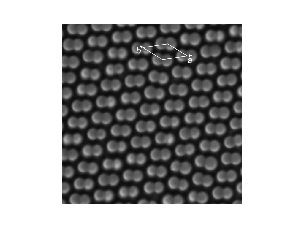 Crystals of Shape-tunable Colloidal Dimers