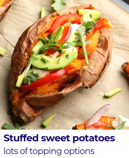 Sweet potato stuffed with sliced avocado, red bell pepper, tomatoes, and arugula.