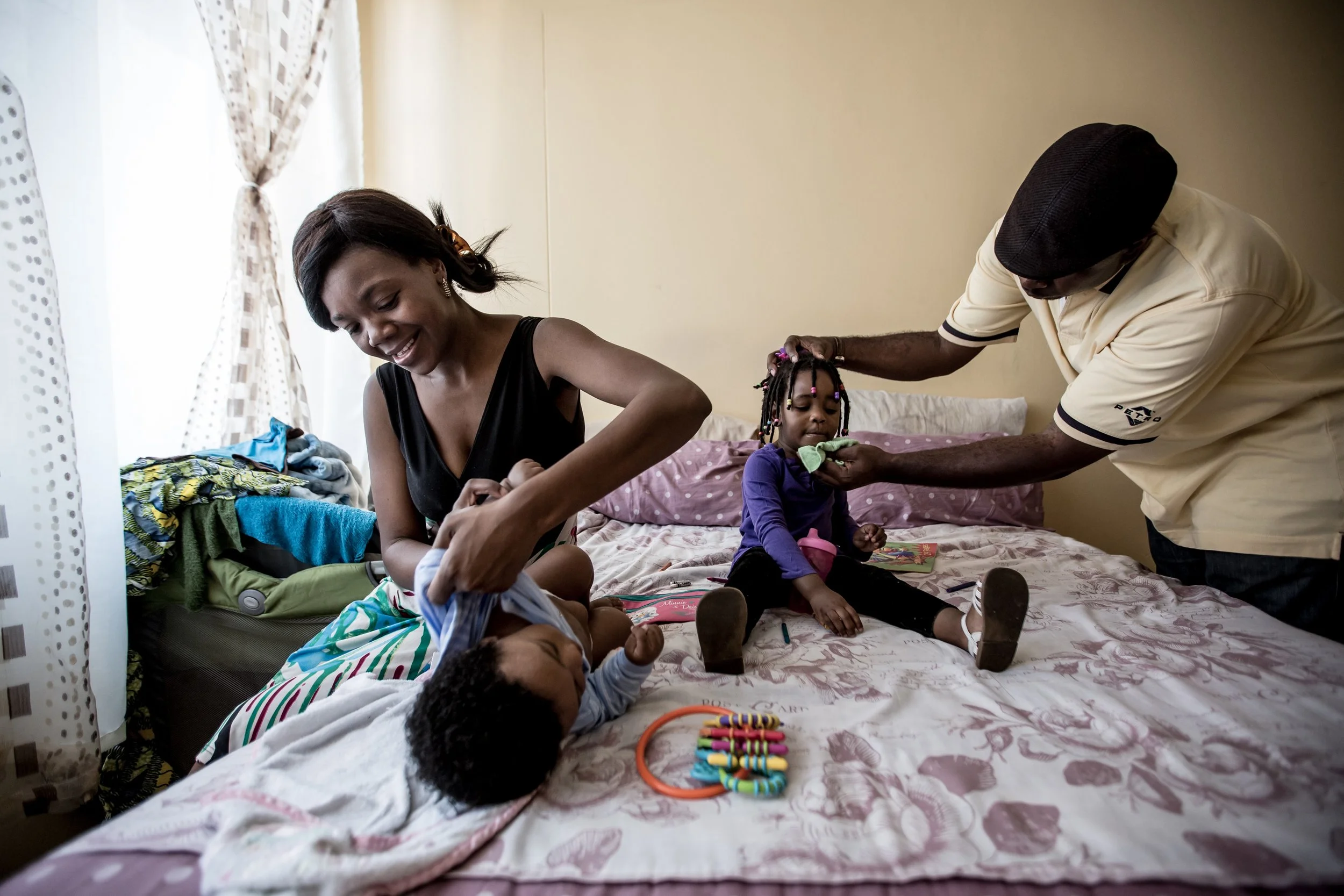 Frank and Sharon care for their family in Johannesburg, South Africa. Copyright Mobile Alliance for Maternal Action. Photograph by Karin Schermbrucker