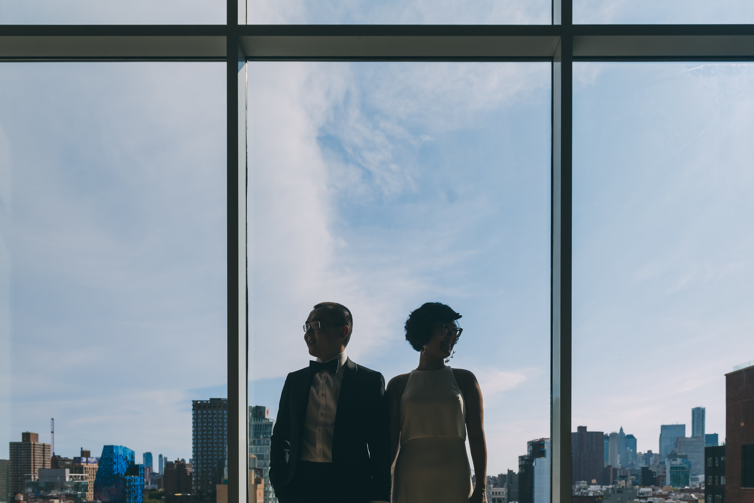 Silhouette of the bride and groom at the Indigo Hotel before their wedding in New York, New York