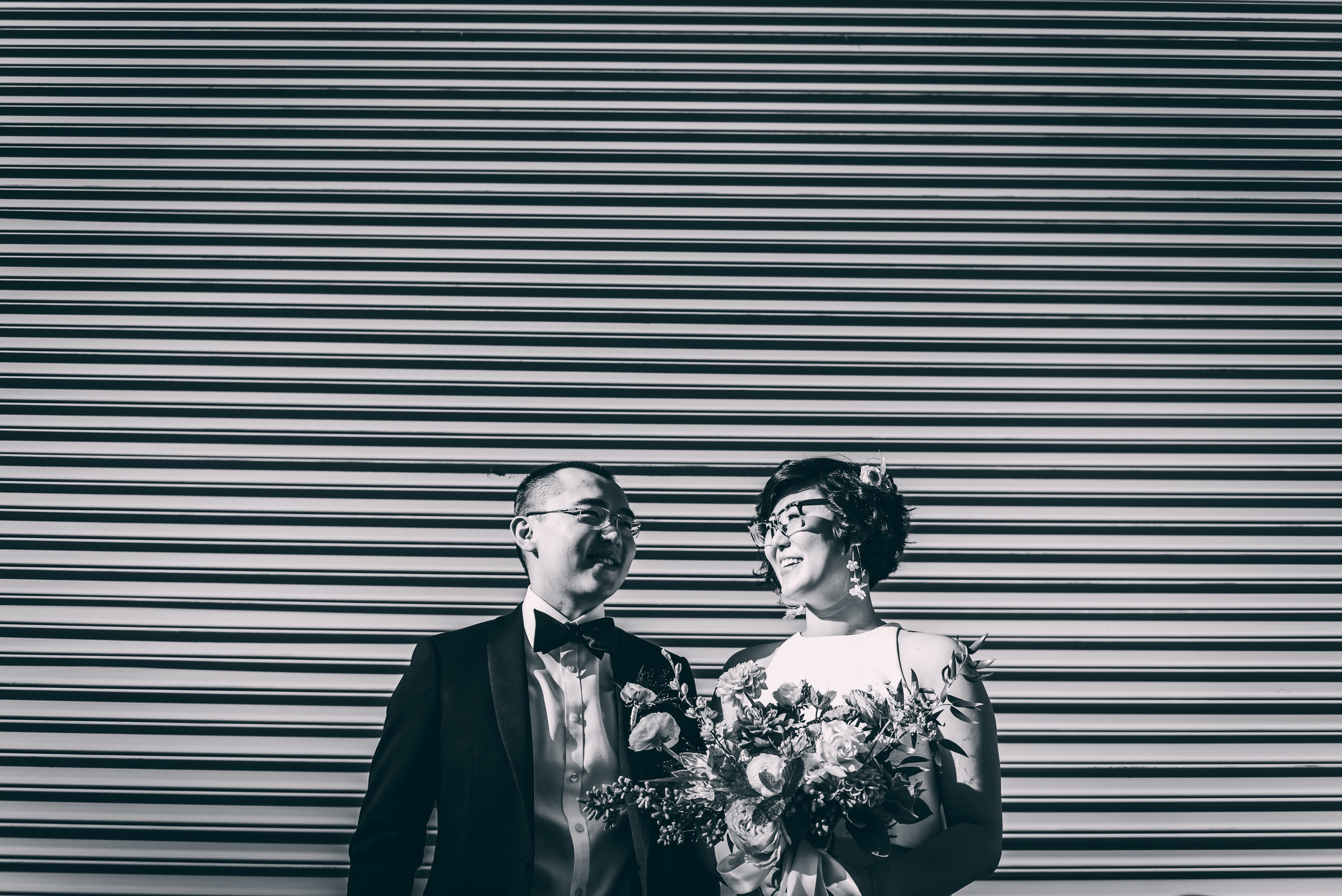 Creative wedding portrait of the bride and groom on their wedding day in New York