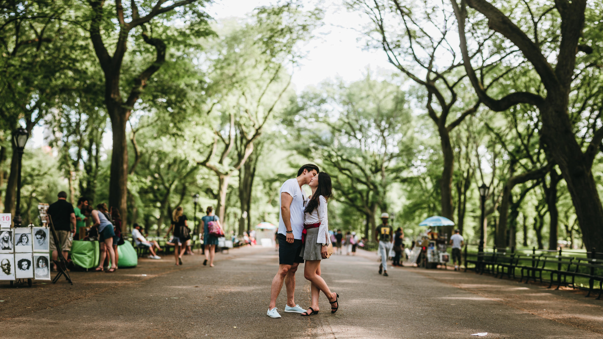 Sabrina and Sean kissing during their engagement photoshoot in Central Park, New York