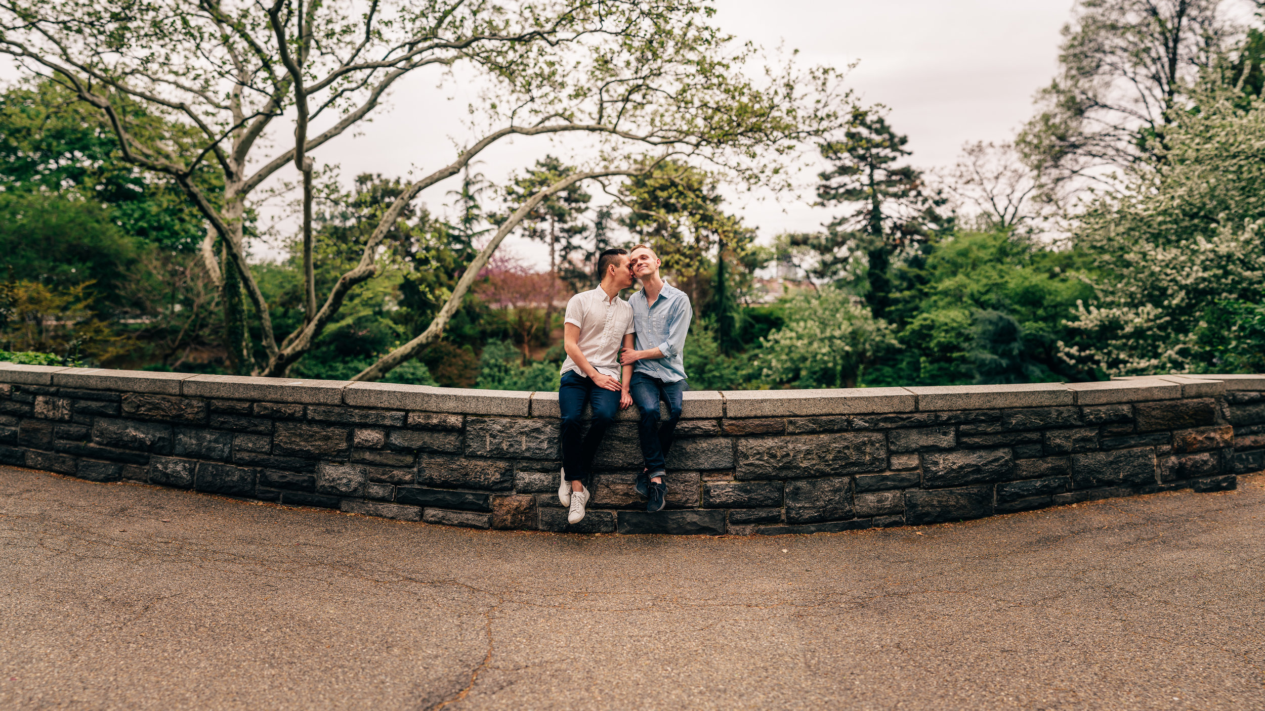 evan and lawrance enjoying a moment together at carl shurz park in the upper east side. I got to work with the two of them as I wanted to try out some new techniques with brenizer panoramas, as well as same sex engagement or couples photography