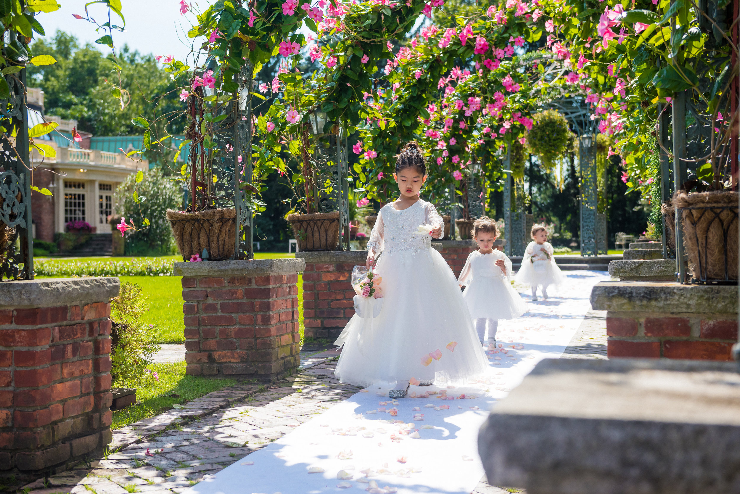 for ping and brents wedding at the manor in west orange, new jersey, they had some of their nieces as flower girls. aren't they adorable?