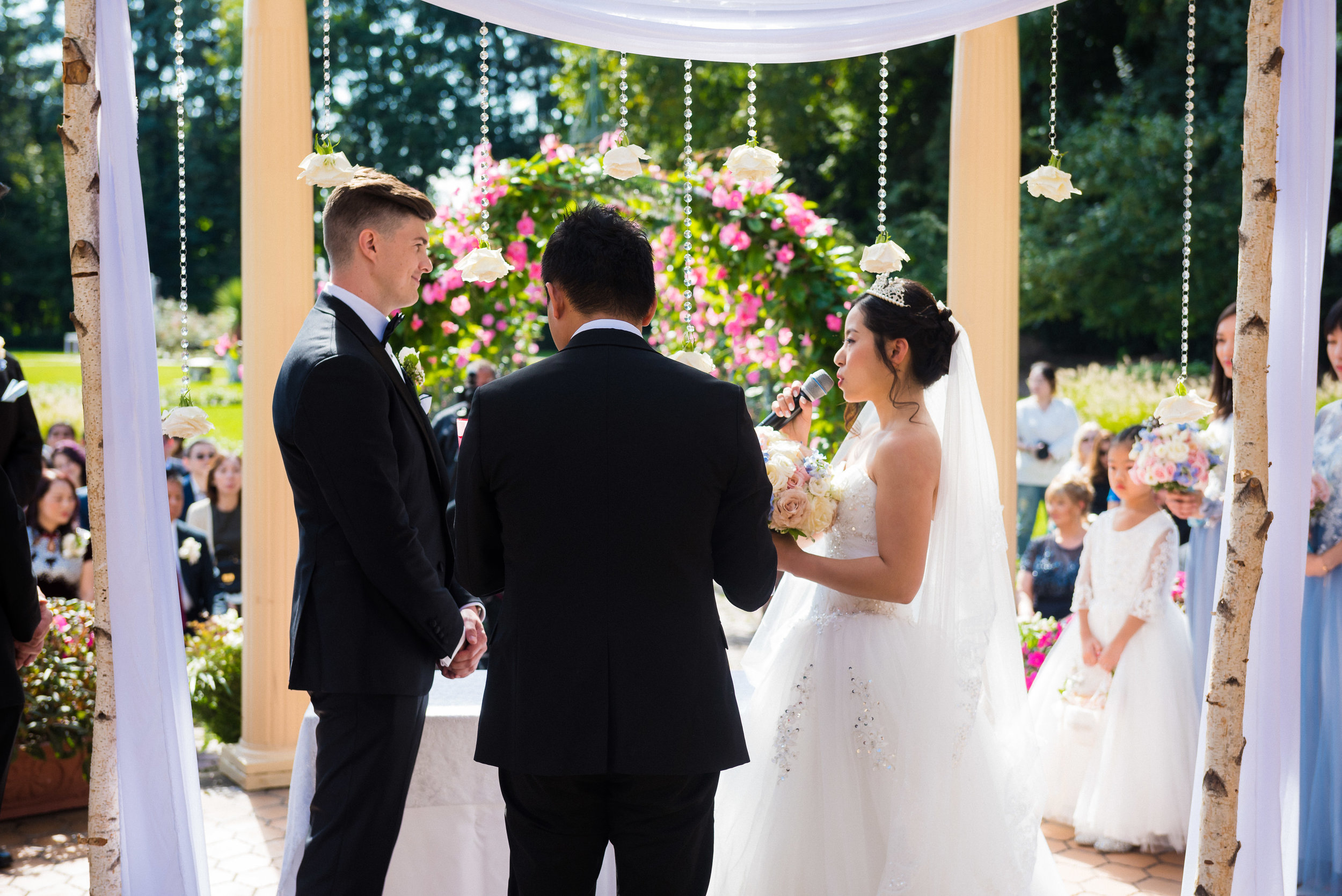  ping and brent both had their own vows during their ceremony. i like the view from behind because you get to see their friends and family in the background watch this new jersey wedding in west orange at the manor. 