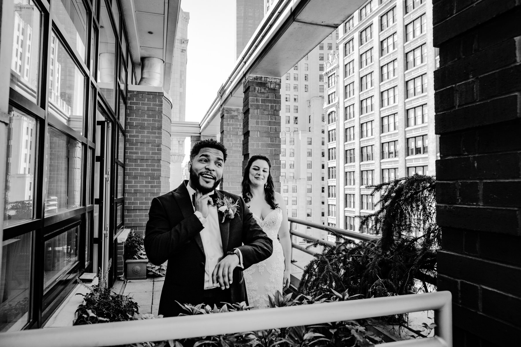  First look between Caitlin and Bryson at the Giraffe Hotel in Midtown Manhattan, New York, before their Wedding Ceremony. We got this impossible angle because we were on the balcony adjacent, so we were able to tell the story without getting in the 