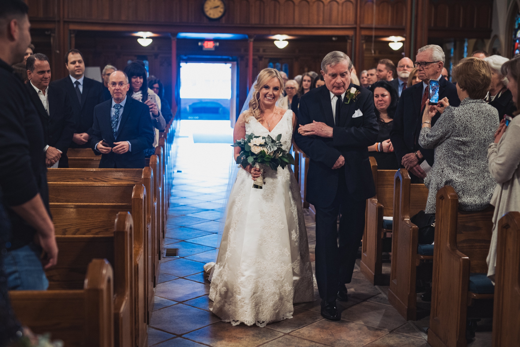  Tara's father walking her down the aisle for her New York wedding in Nyack. 