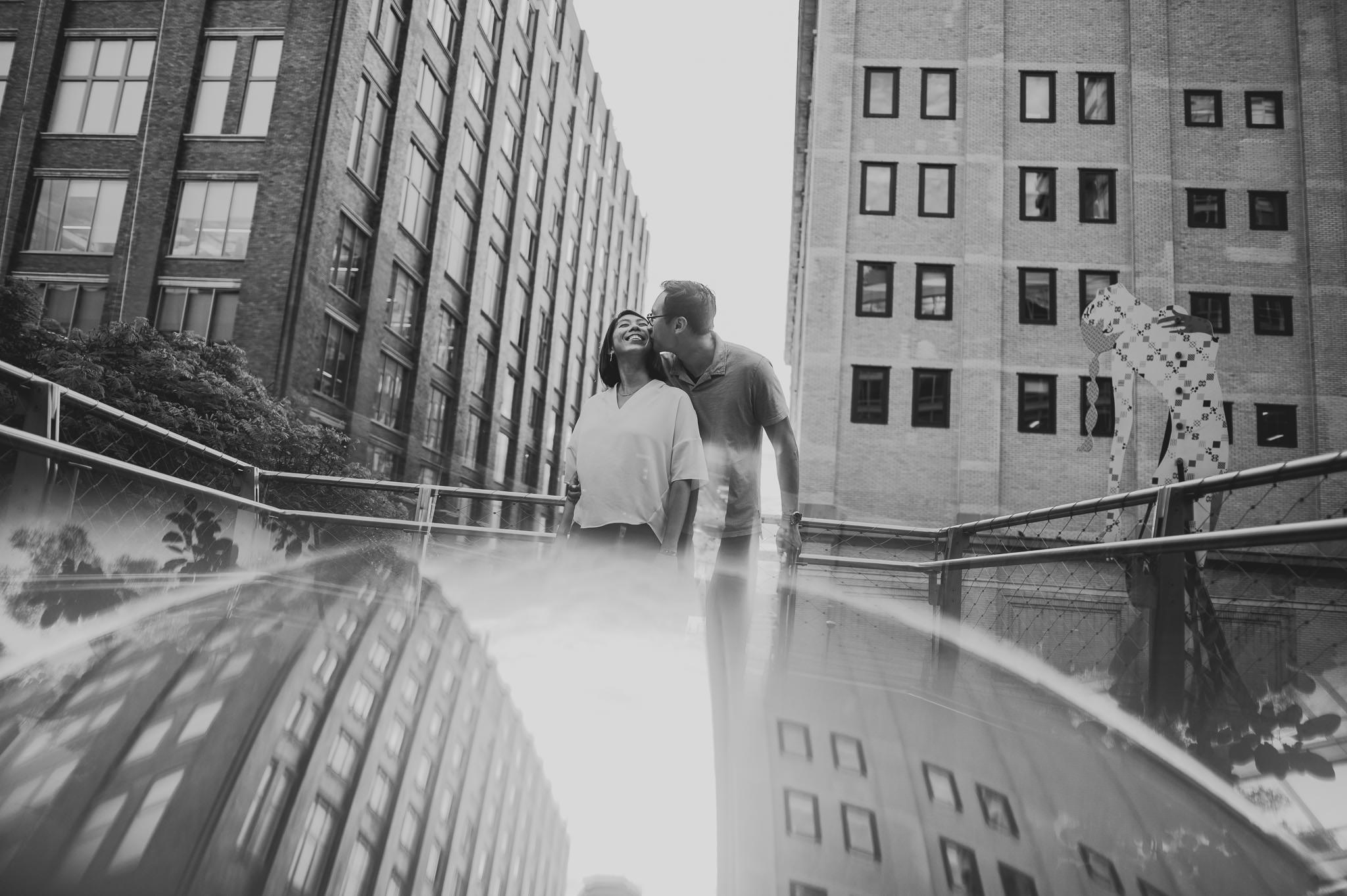 Man and woman kissing during their Chelsea Wedding Engagement photos