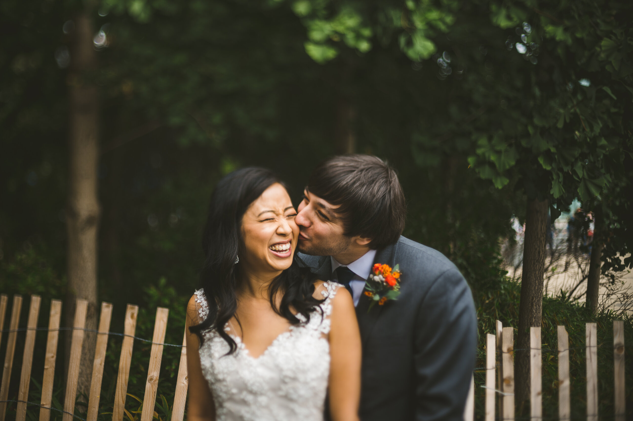 Bride and groom photographed in DUMBO, New York with a broken nifty 50 that I am freelensing