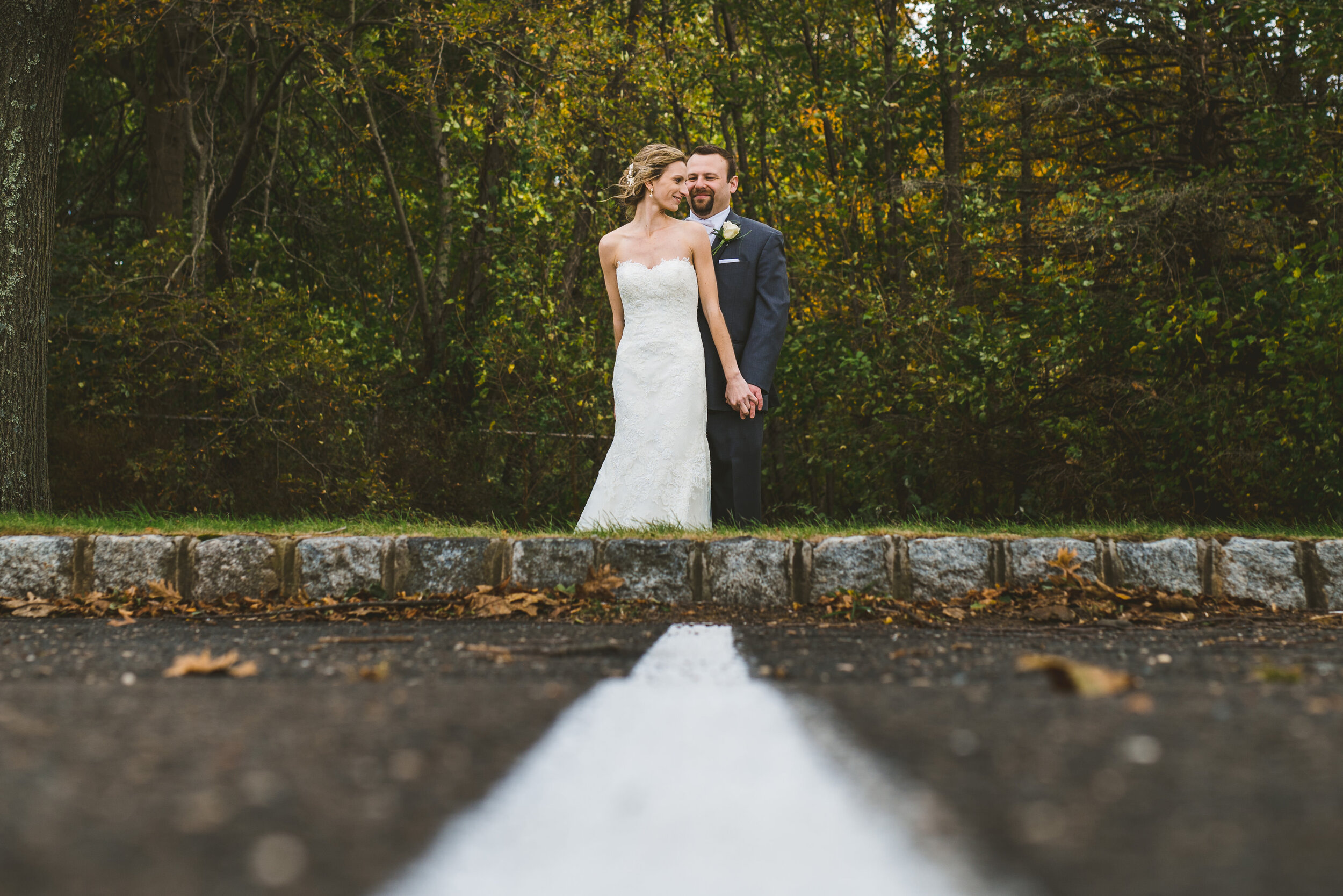 Creative and dynamic portrait taken in the parking lot during a New Jersey New York wedding