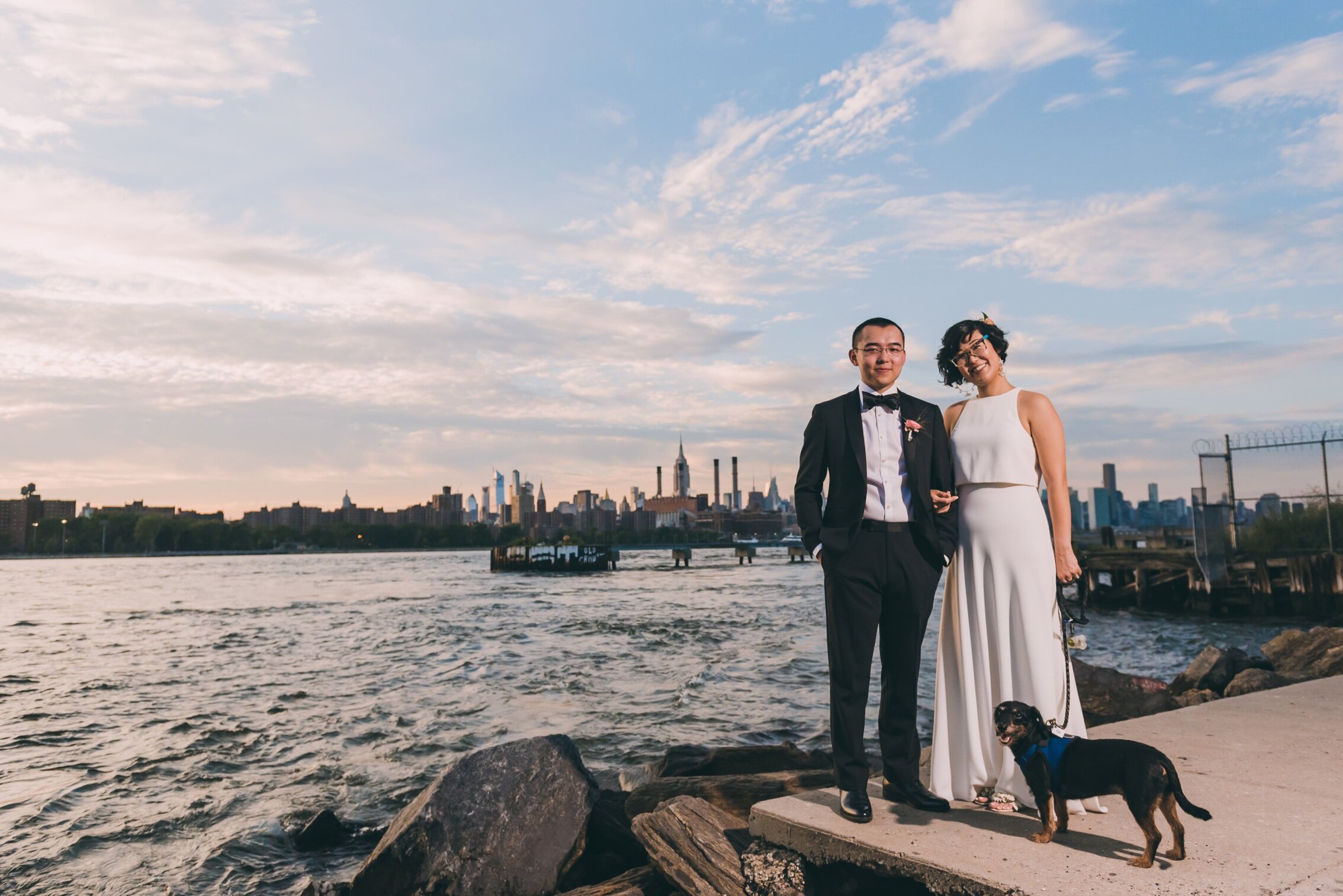 Wedding portrait taken with the bride and groom's dog in New York, New York