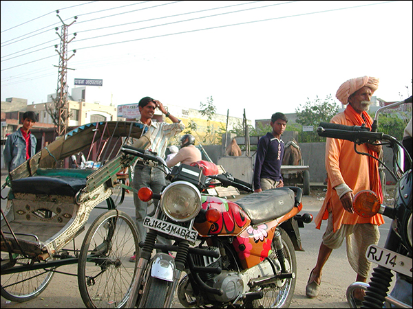 Bikes rickshaws men.jpg