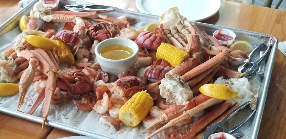 NOW FEATURING: The Seafood Feast - Over Seven Pounds of Seafood! Including Tail on Shrimp, Alaskan Snow Crab Legs, & Lobster Tails!