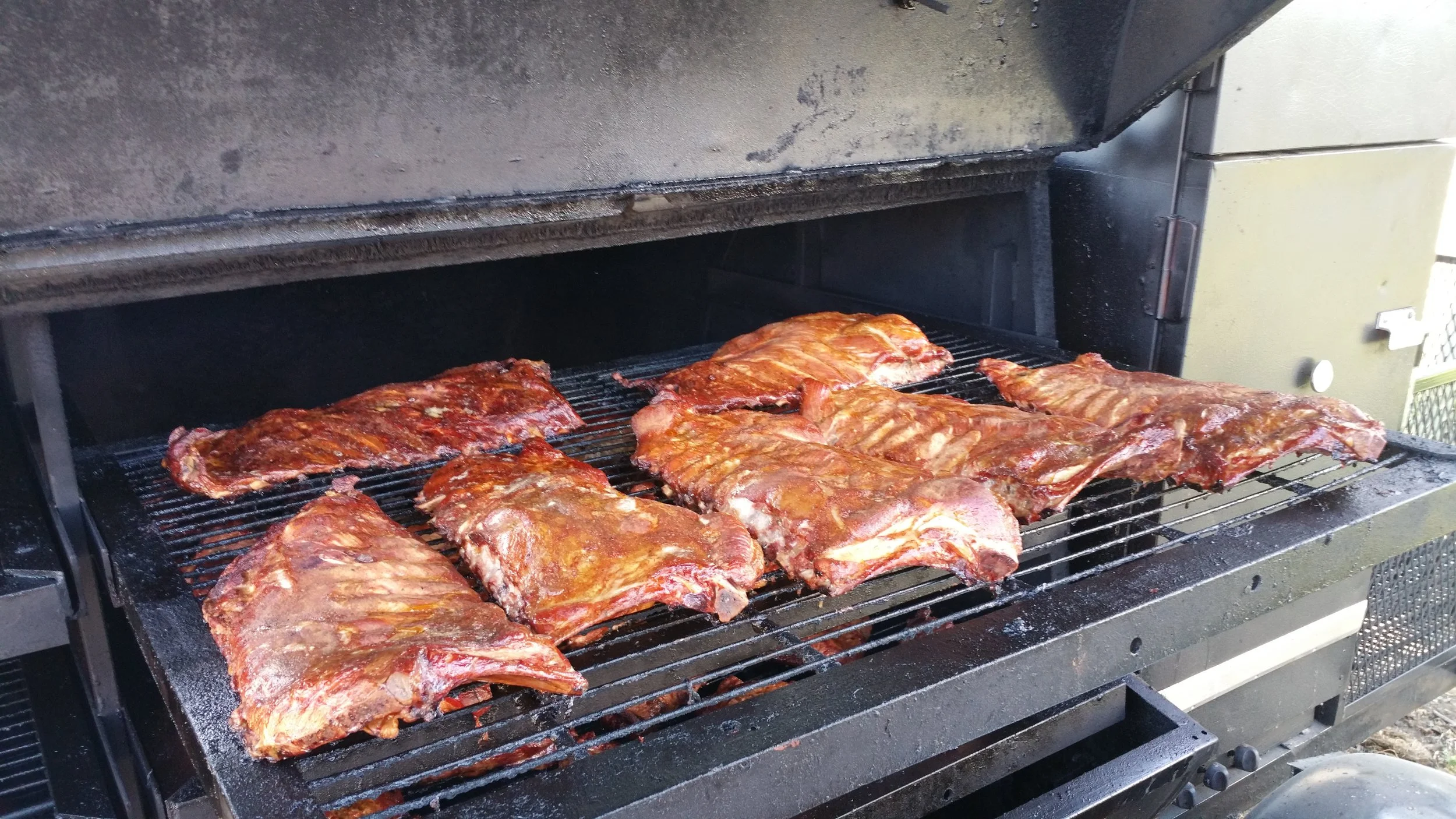 10 lbs Chicken Hindquarters 2 Slabs Pork Ribs 2 quart Side Items 15 Dinner Rolls Cost: 110.00