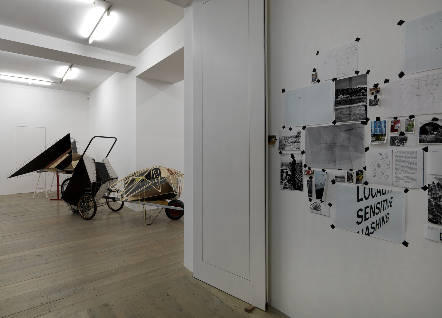 Installation view with research wall