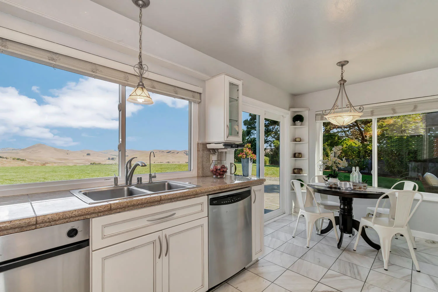 Sweeping scenic views and incredible natural light fill the beautifully remodeled kitchen!