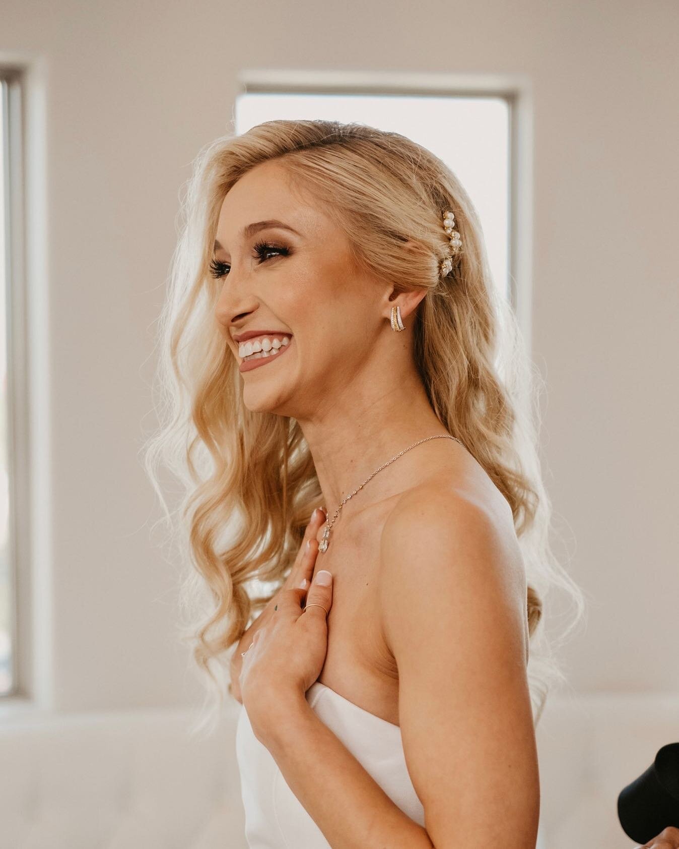 A smile so big it&rsquo;s contagious! This glowing bride was thrilled after seeing her hair and makeup on this special day! We love getting to play a small role on your special day 🤍