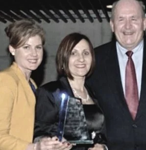 With my former colleague, receiving a Prime Minister’s Award from General Sir Peter Cosgrove in 2011 for our social inclusion and employment programs