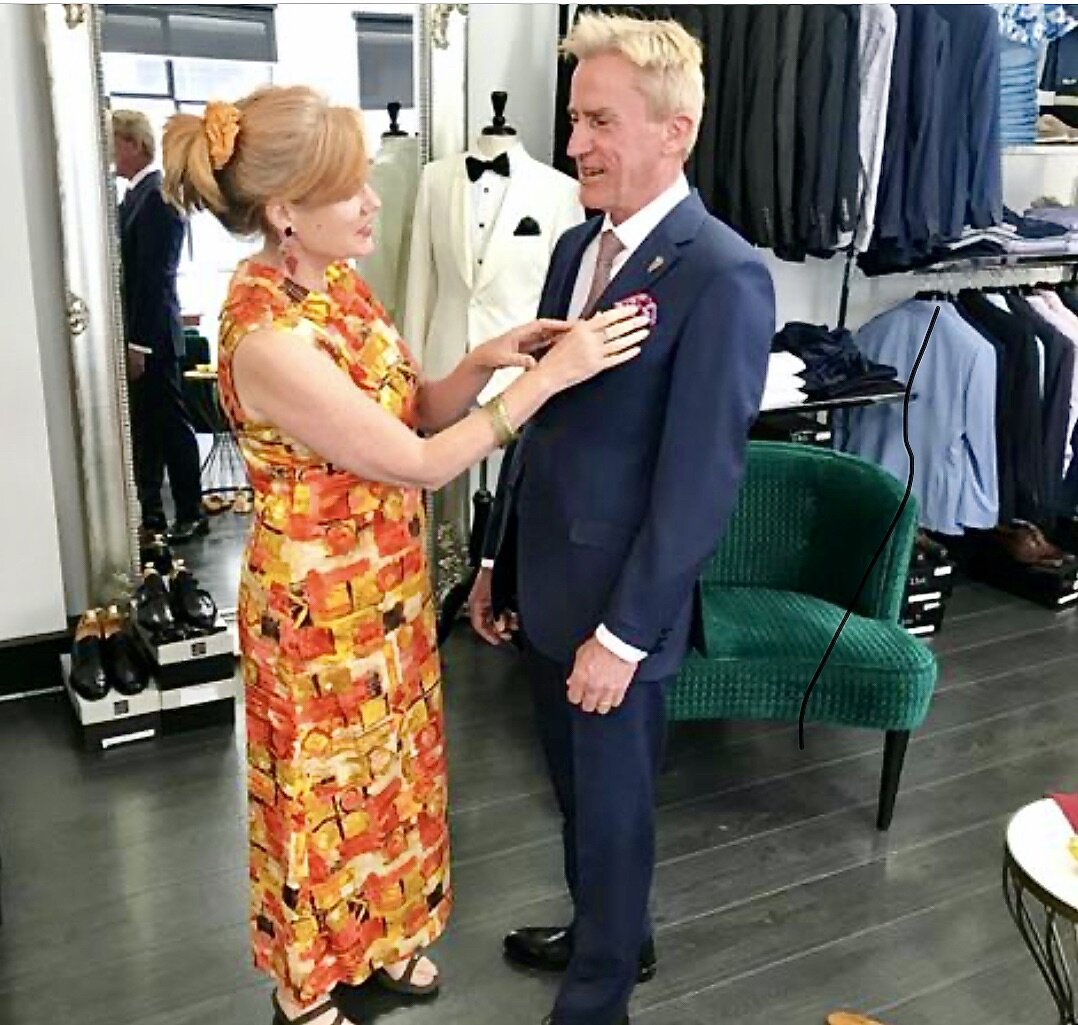 Stylist, Donna shopping for a suit with male client