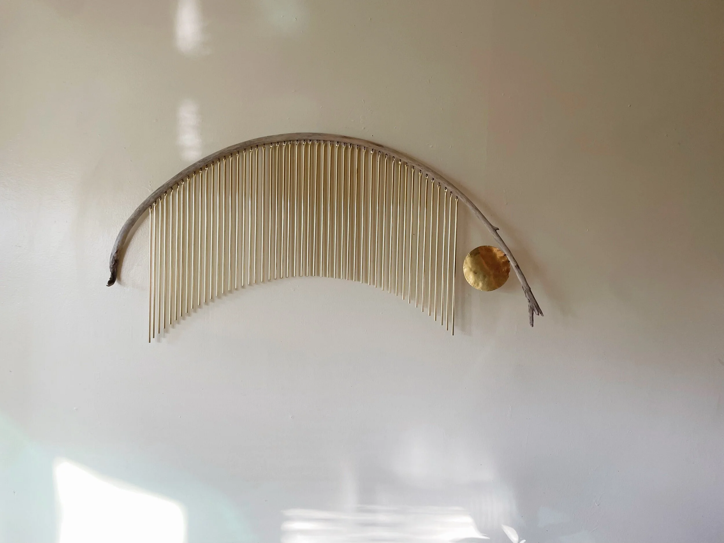 driftwood brass wall art