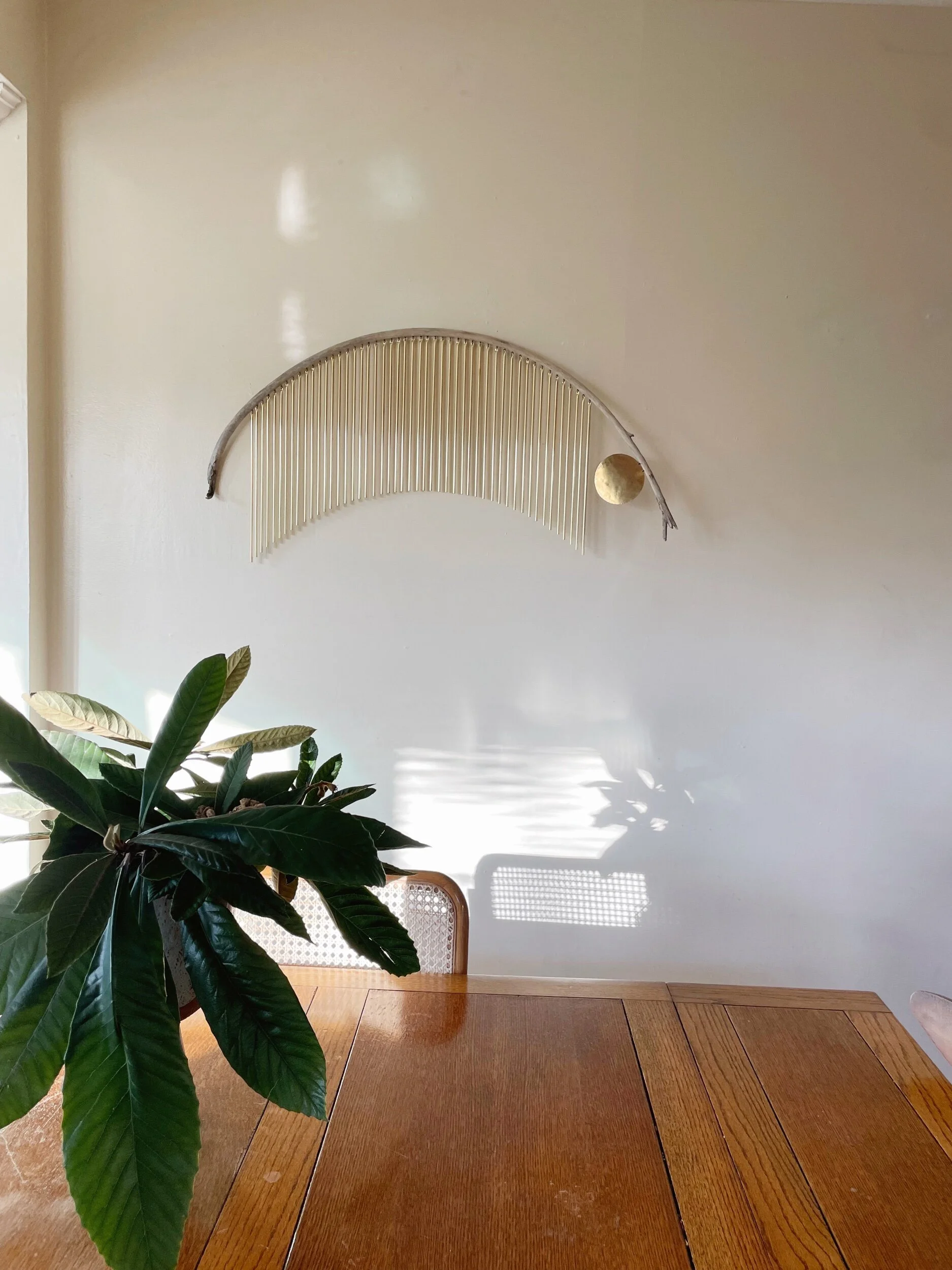 driftwood brass wall art