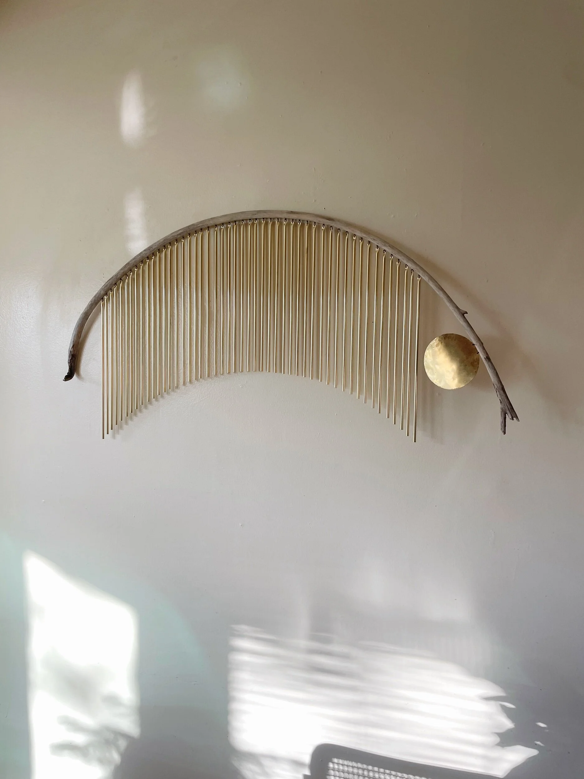 driftwood brass wall art