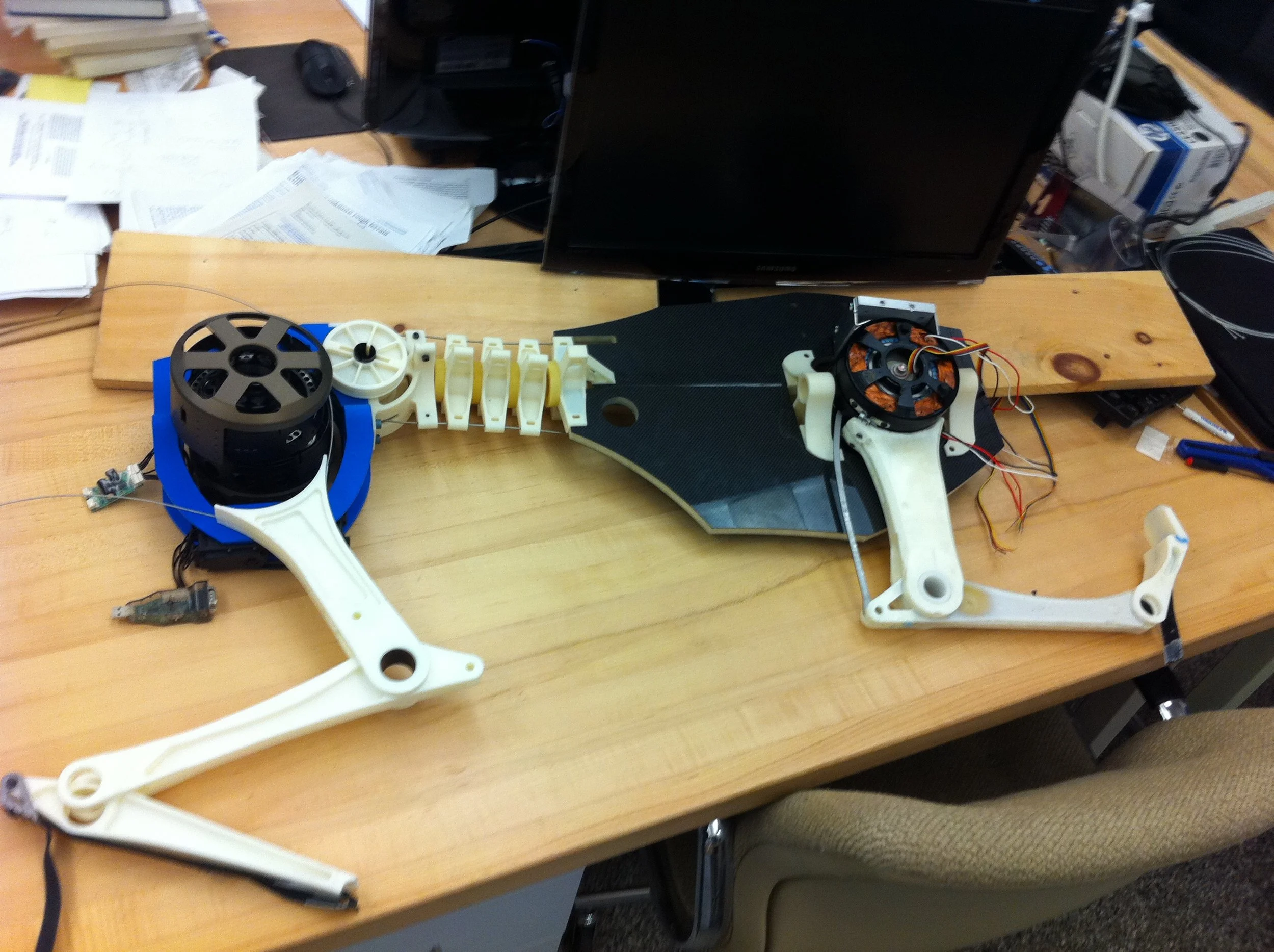  I worked in the Biomimetic Robotics Laboratory for two years as an undergraduate researcher. During this time I researched Cheetah locomotion and designed a new version of the mechanical spine for the MIT Cheetah robot. I also created a simple tail 