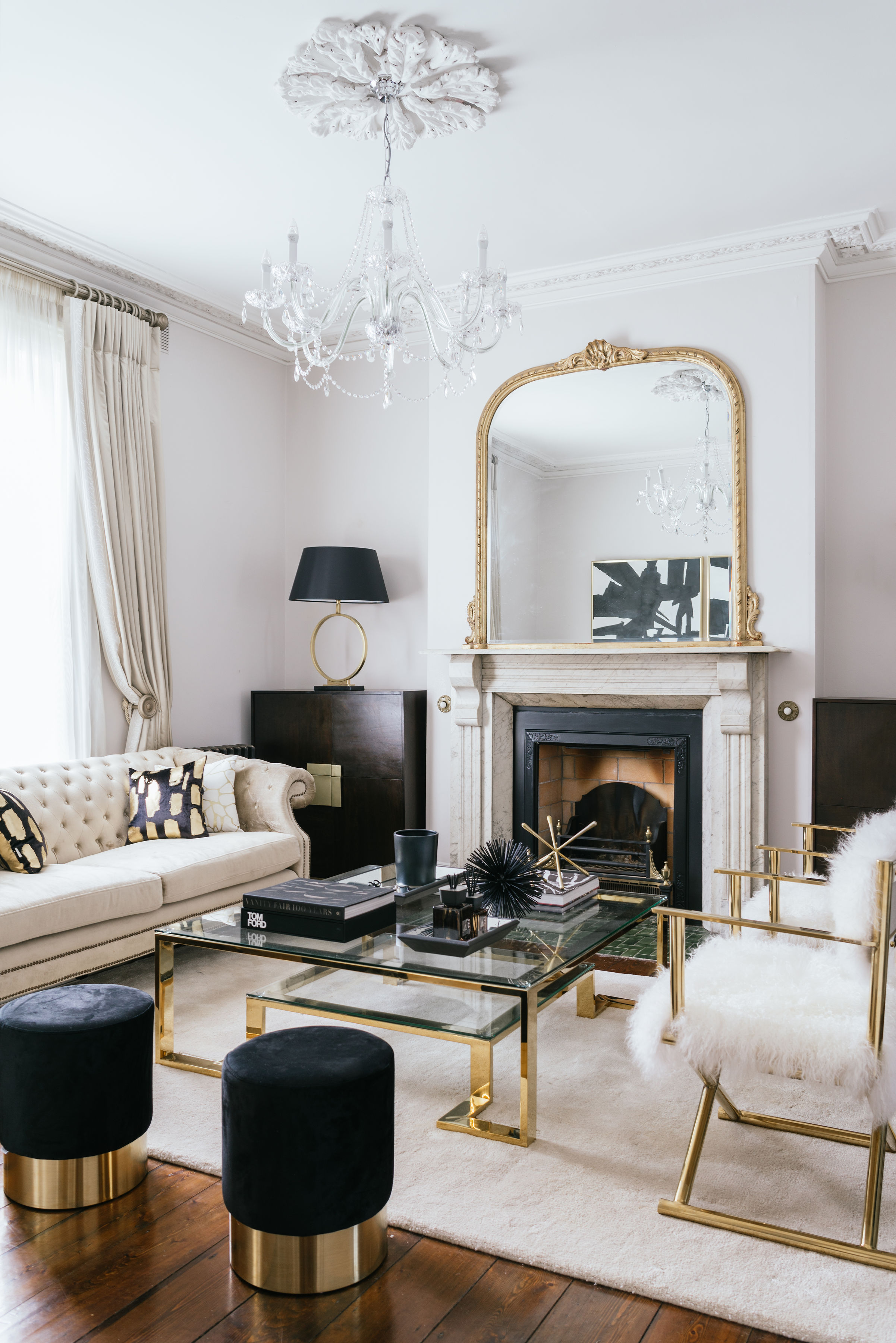 white, black and gold living room