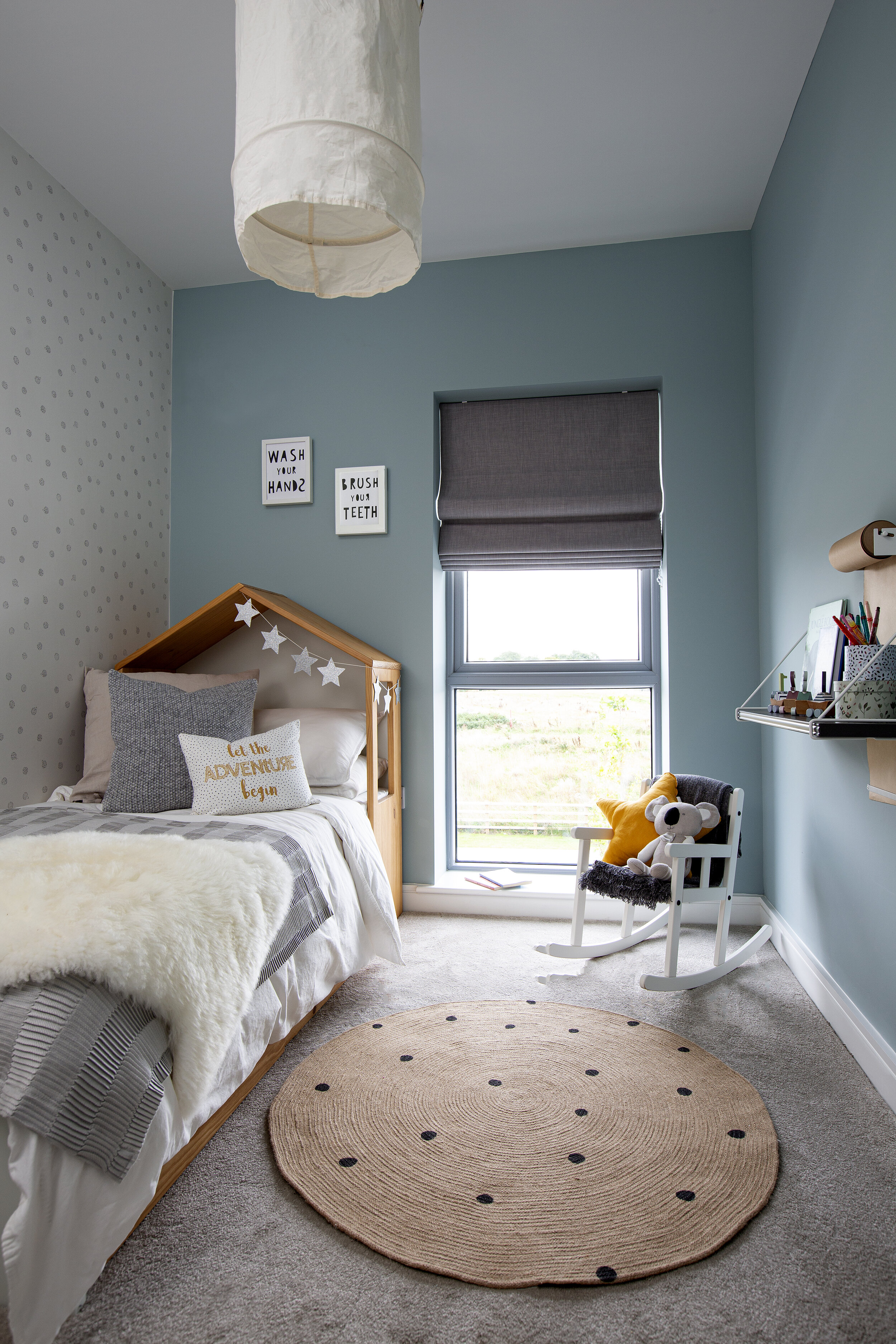 blue kids room with 3d house bed frame
