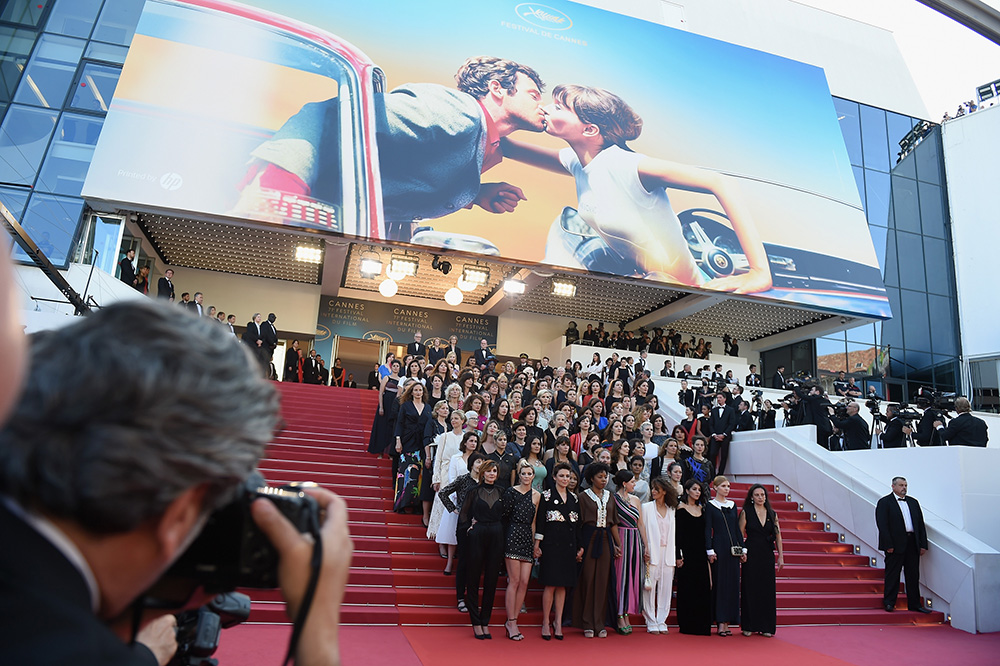 Jury head Cate Blanchett and director Agnes Varda reads a statement on the steps of the red carpet in protest of the lack of female filmmakers honored throughout the history of the festival. Photo by Antony Jones/Getty Images