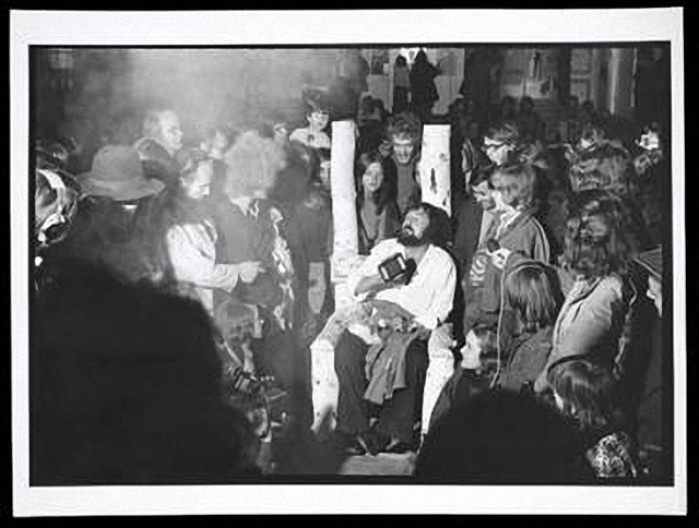 Harald Szeemann (seated) on the last night of documenta 5: Questioning Reality–Image Worlds Today at Museum Fridericianum, 1972. The Getty Research Institute, 2011.M.30. Photo: Balthasar Burkhard