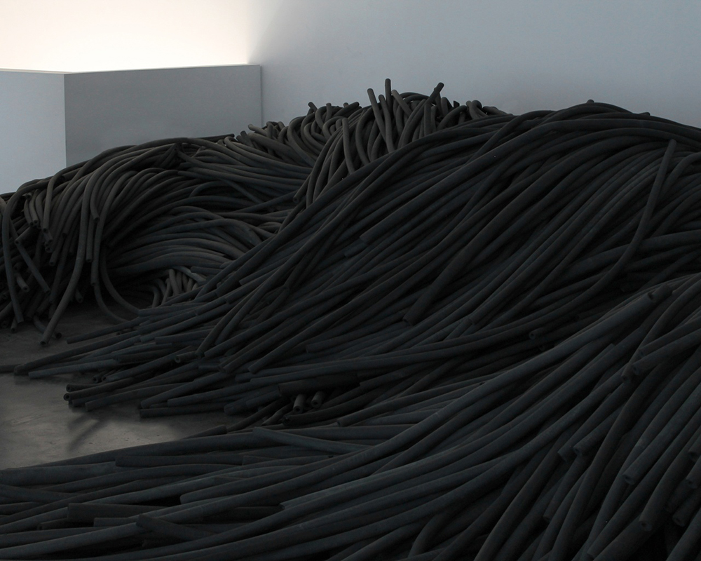 Cover Image: KERNEL (Pegy Zali, Petros Moris, and Theodoros Giannakis), Torrent, 2016. Disposed plastic cable jackets, dimensions variable. Courtesy the artist