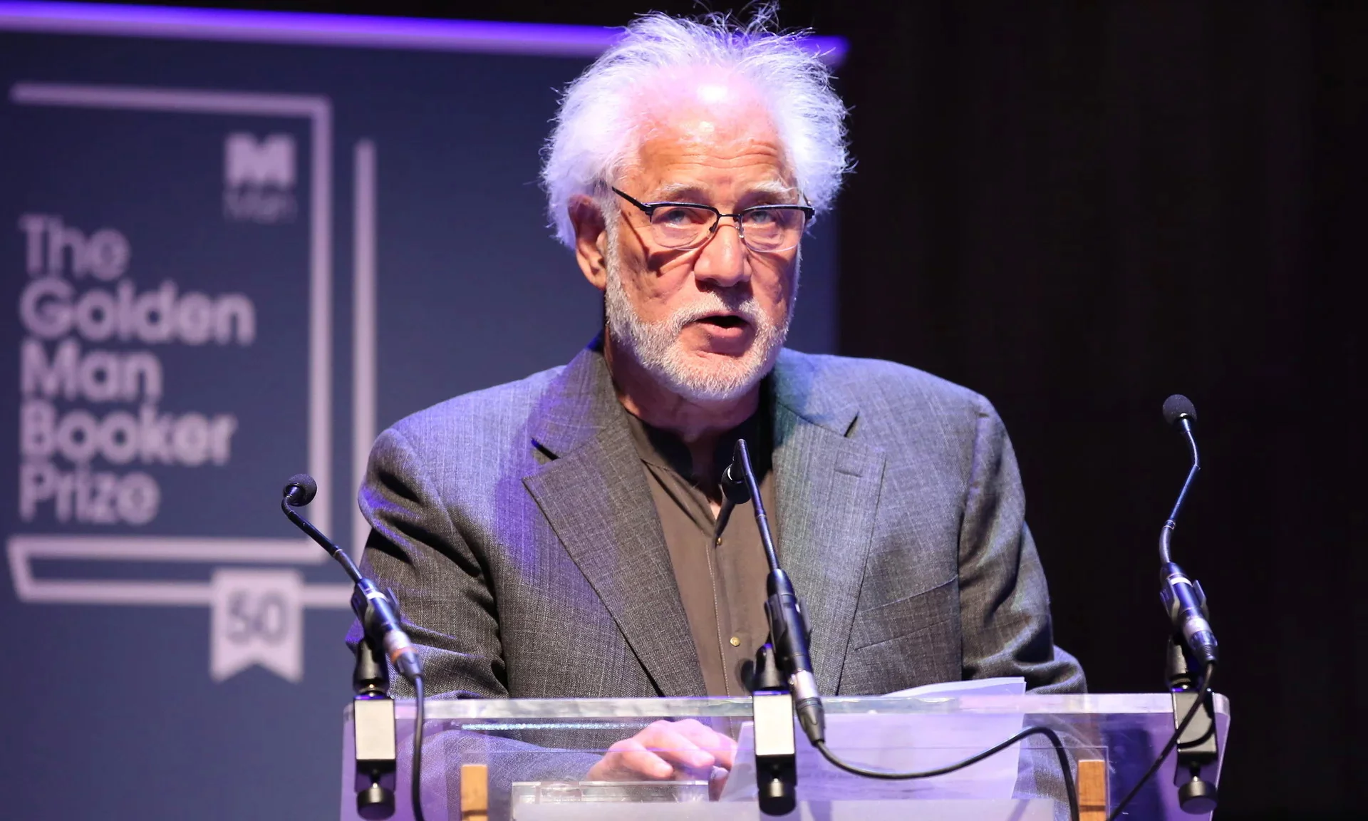 Michael Ondaatje speaks after being named the winner of the Golden Man Booker prize. Photograph: Isabel Infantes/PA