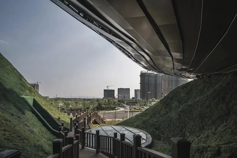 the lower body and the city park form the shape of mountain which becomes the functional part of museumimage by CROX