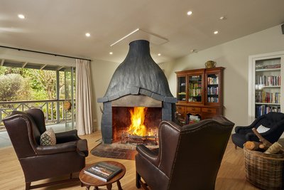 Awaroa_Lodge_Library_Fireplace.jpg