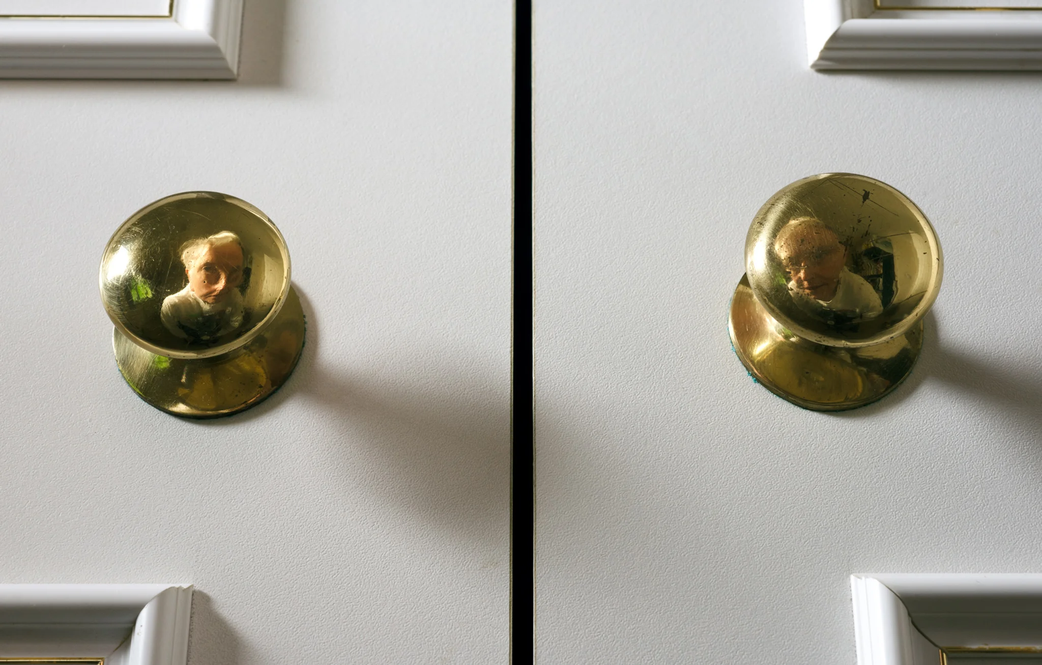 'Graham's reflected 1', Graham Land, June, 2018. Created by positioning an LED light close to me face with the camera fitted with a macro lens focused on the two brass wardrobe door knobs.