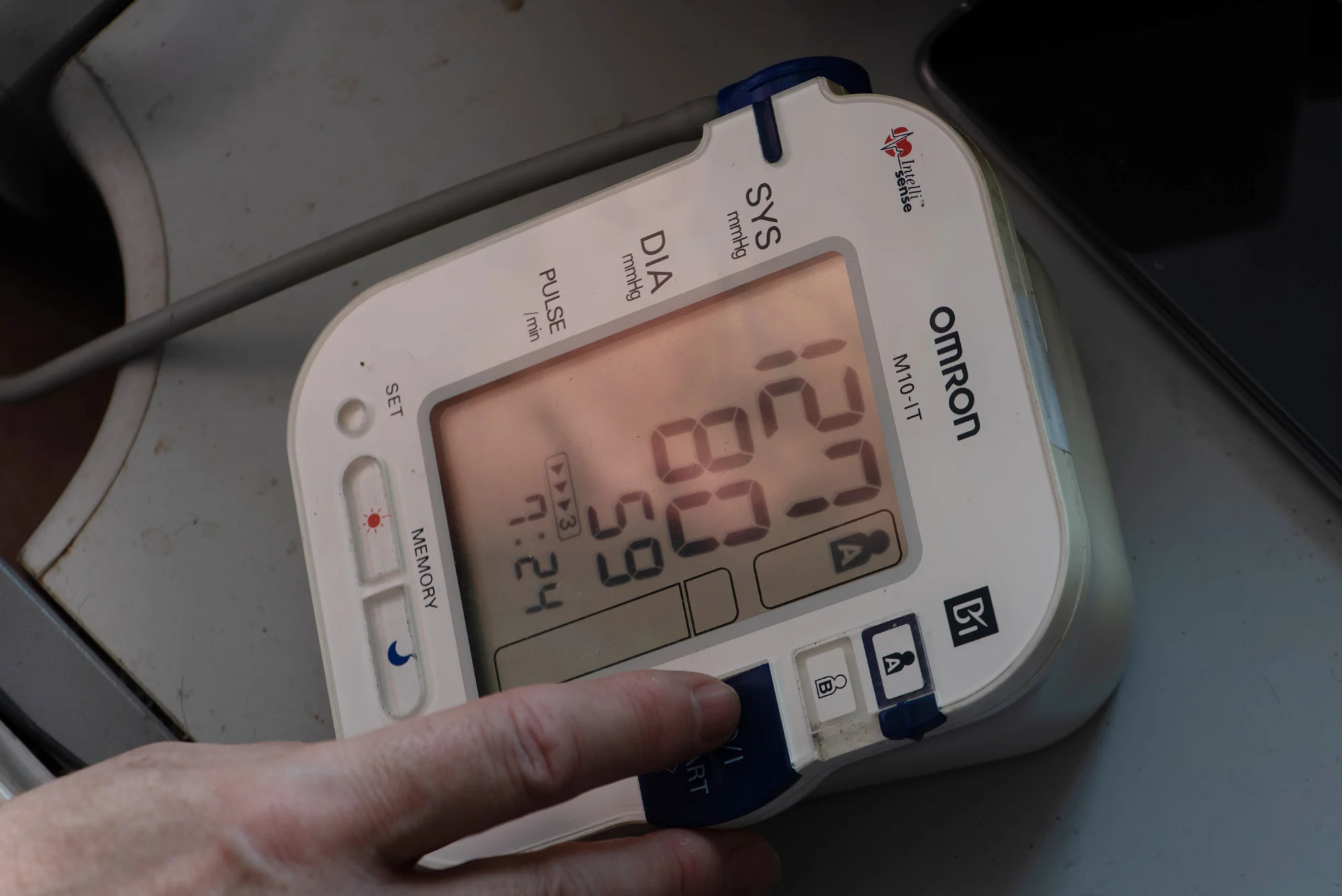 Face in BP monitor on a very unclean desktop surface. Taken by Graham Land, 4th August, 2018