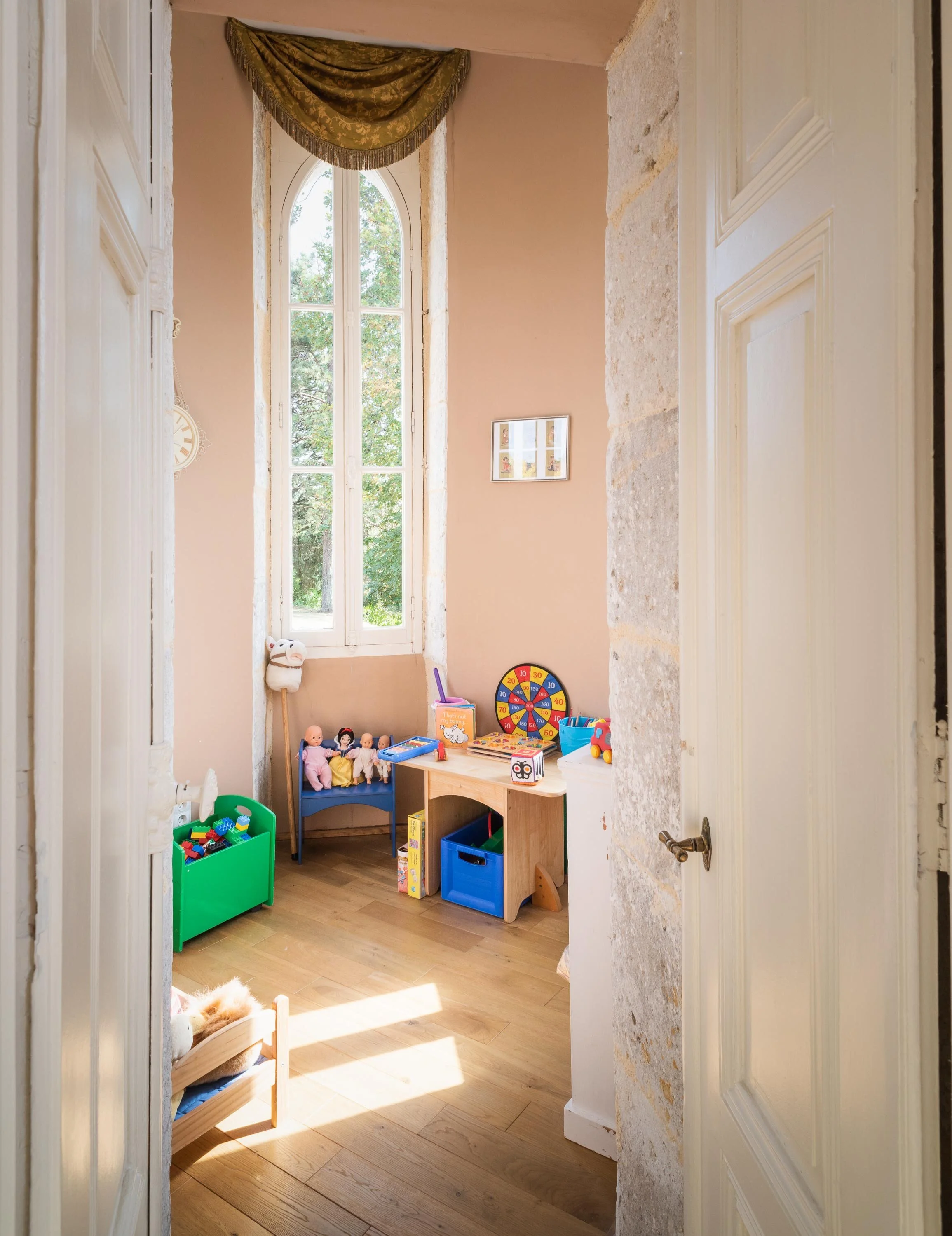 Children's toys room in the ground-floor tower at Château Lasfargues, annexed to the main living room.
