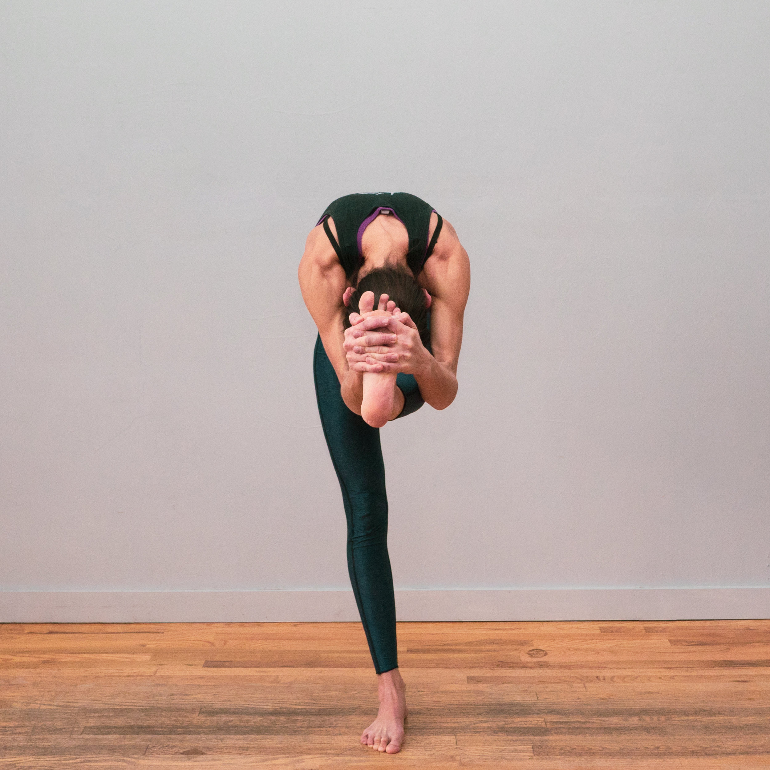 Standing Head to Knee Pose - Exercise How-to - Skimble