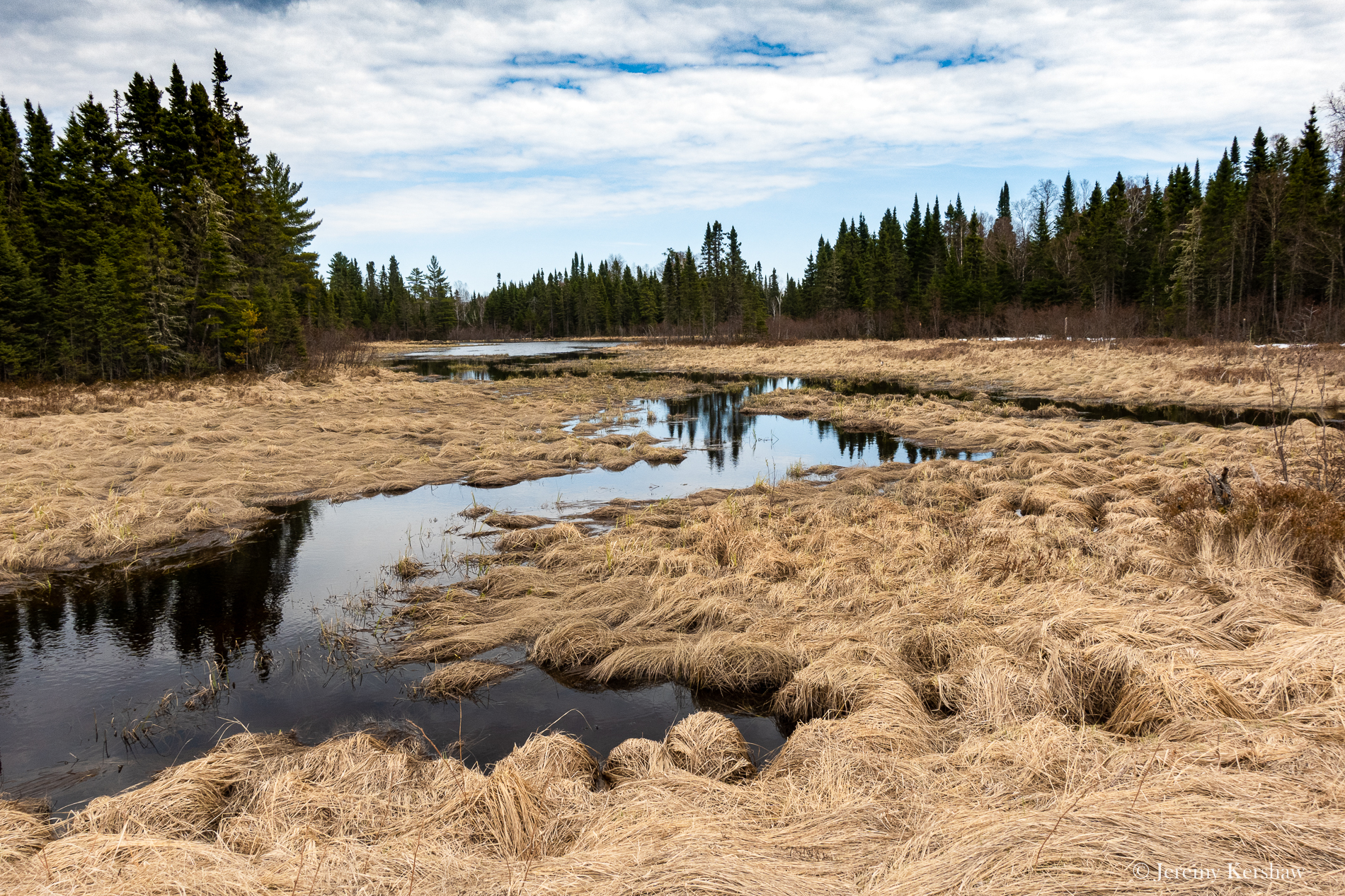 One of the many roadside waterways on course