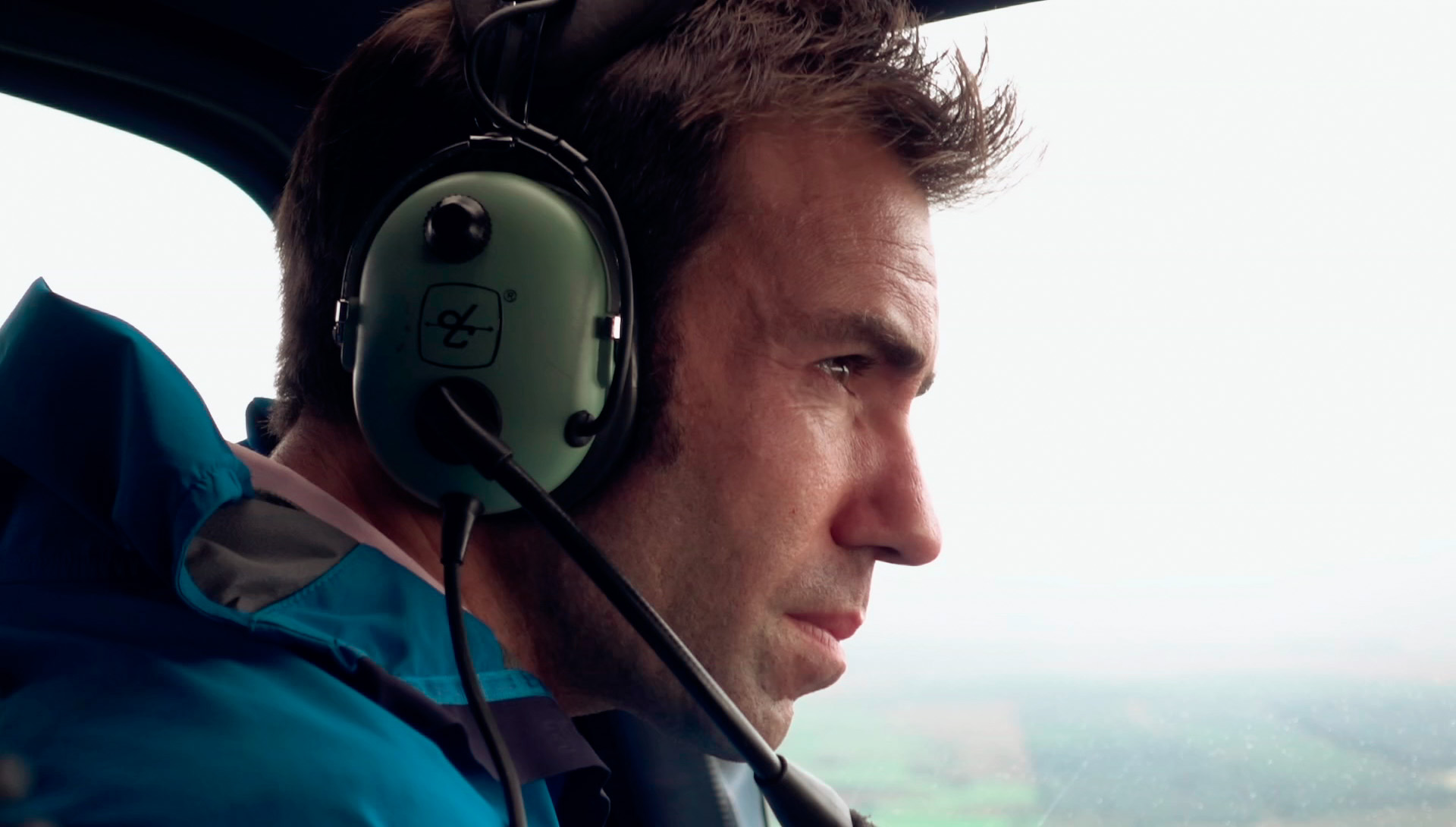 James Crawford in a helicopter filming Scotland from the Sky