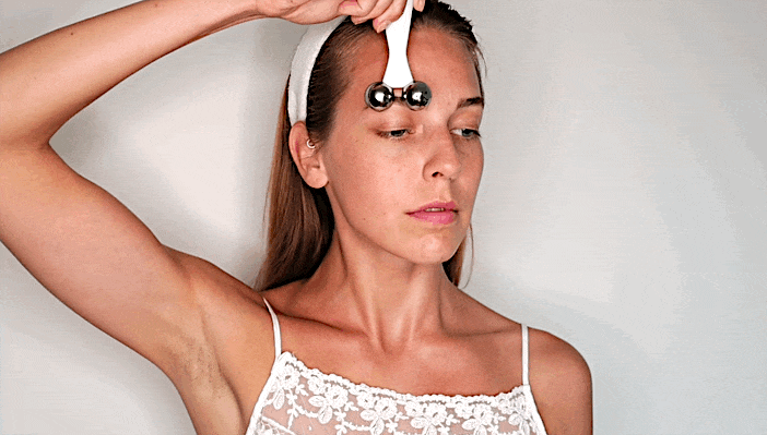 Continue with vertical movements, repeating throughout your forehead.