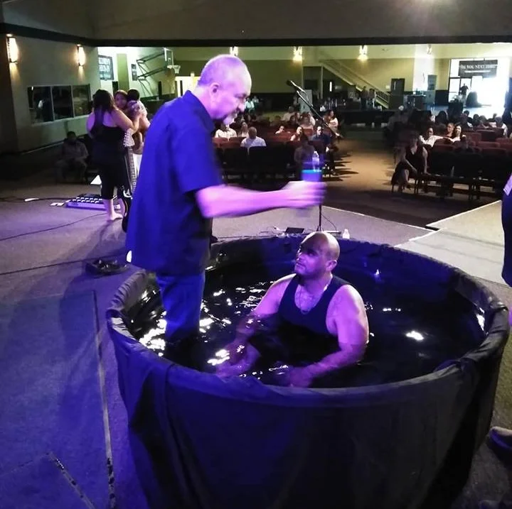 guy getting baptised.jpg