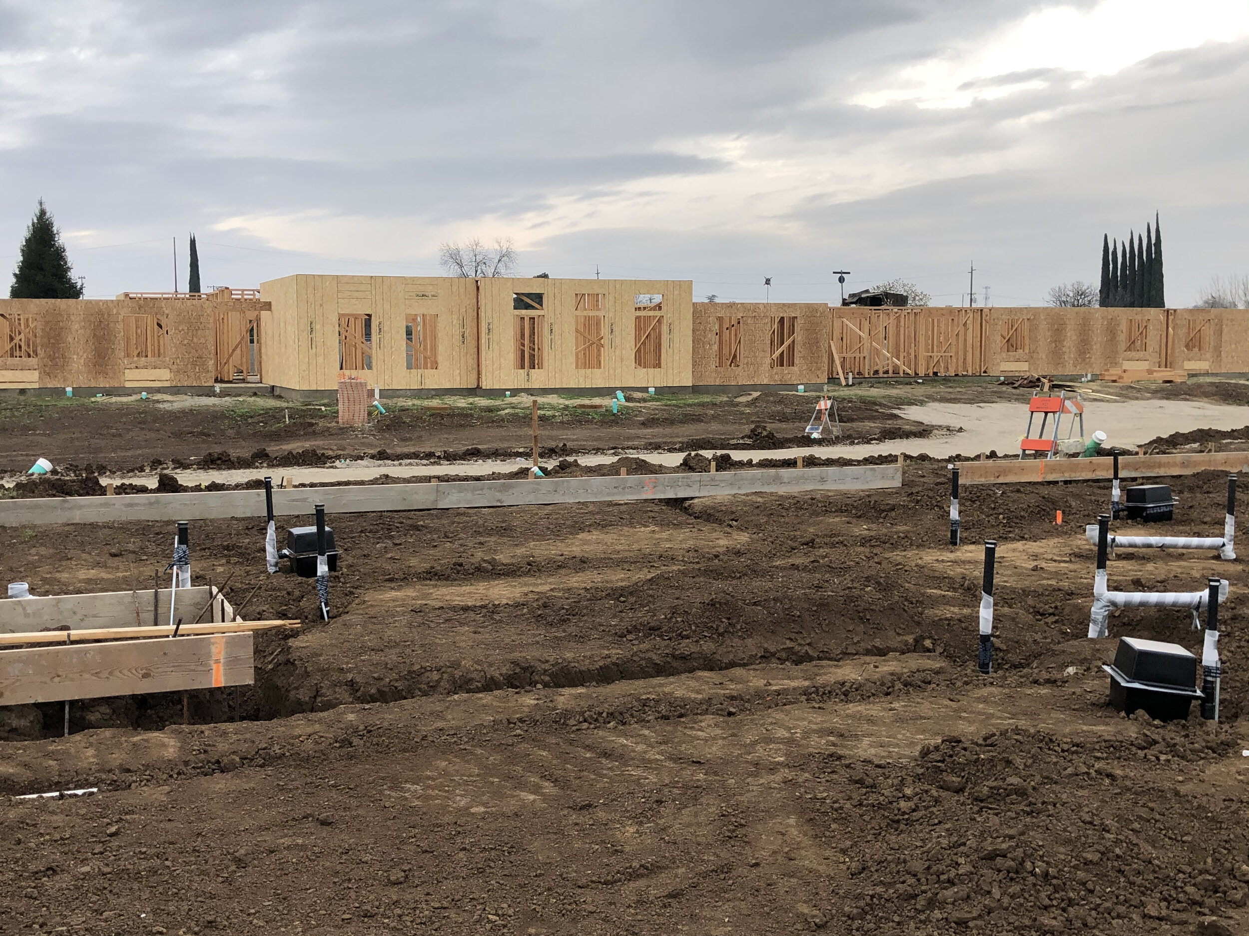 Construction 1.2021 - veterans before cement pad and respite care in back.jpg