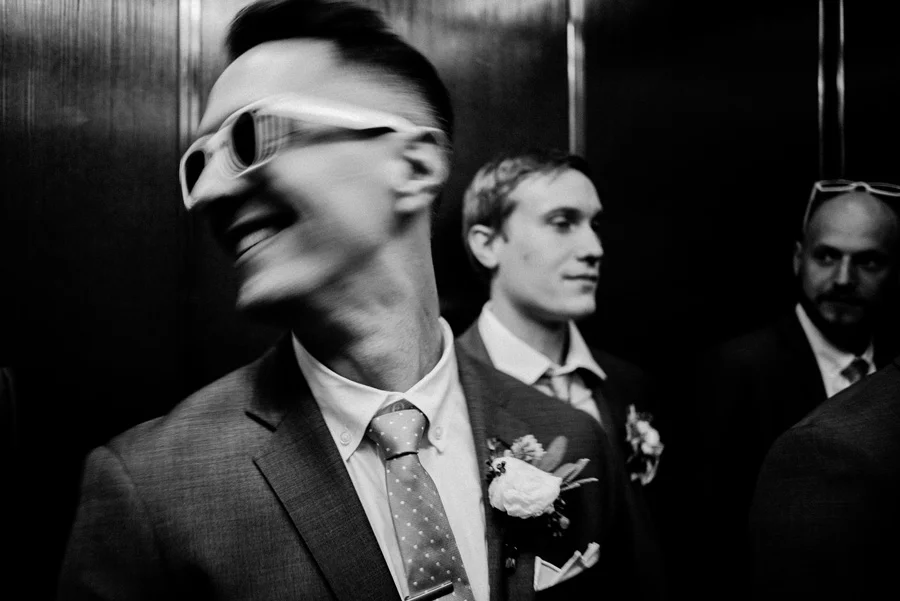Groom in elevator.
