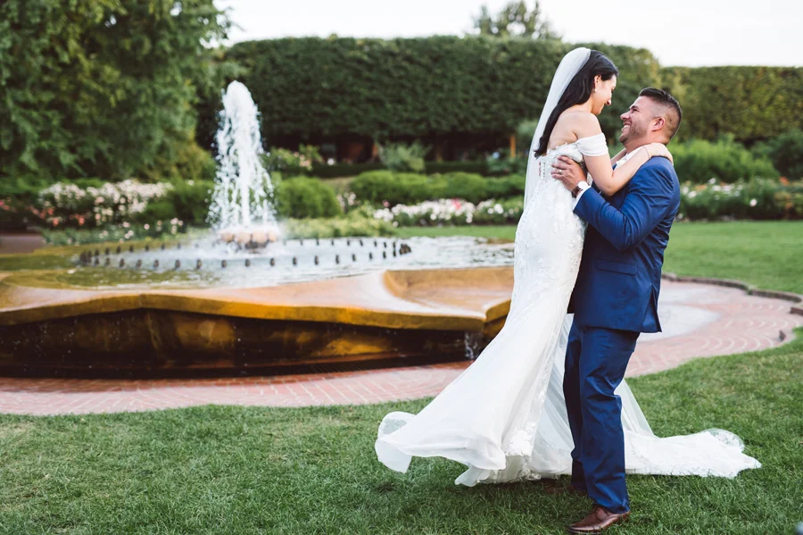 Bride and groom in Rose Garden at Chicago Botanic Garden.