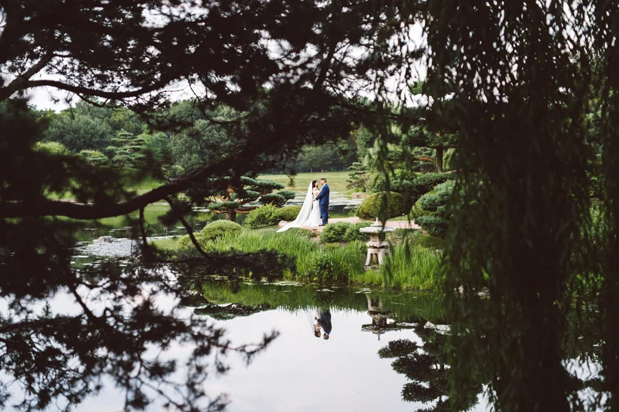 Bride and groom at the Japanese Garden in Chicago Botanic Garden.