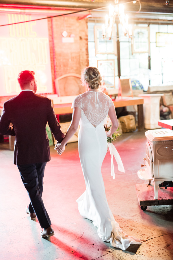 Bride and groom exit from their ceremony at Salvage One.